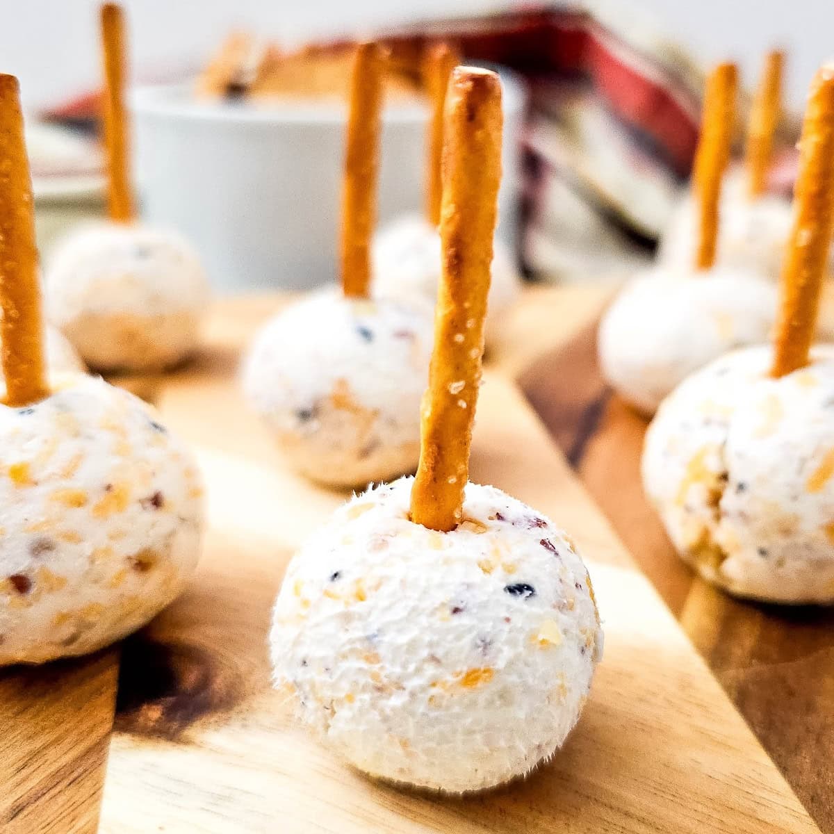 Cheeseball Bites on Pretzel Sticks 1 cheeseball bites featured image