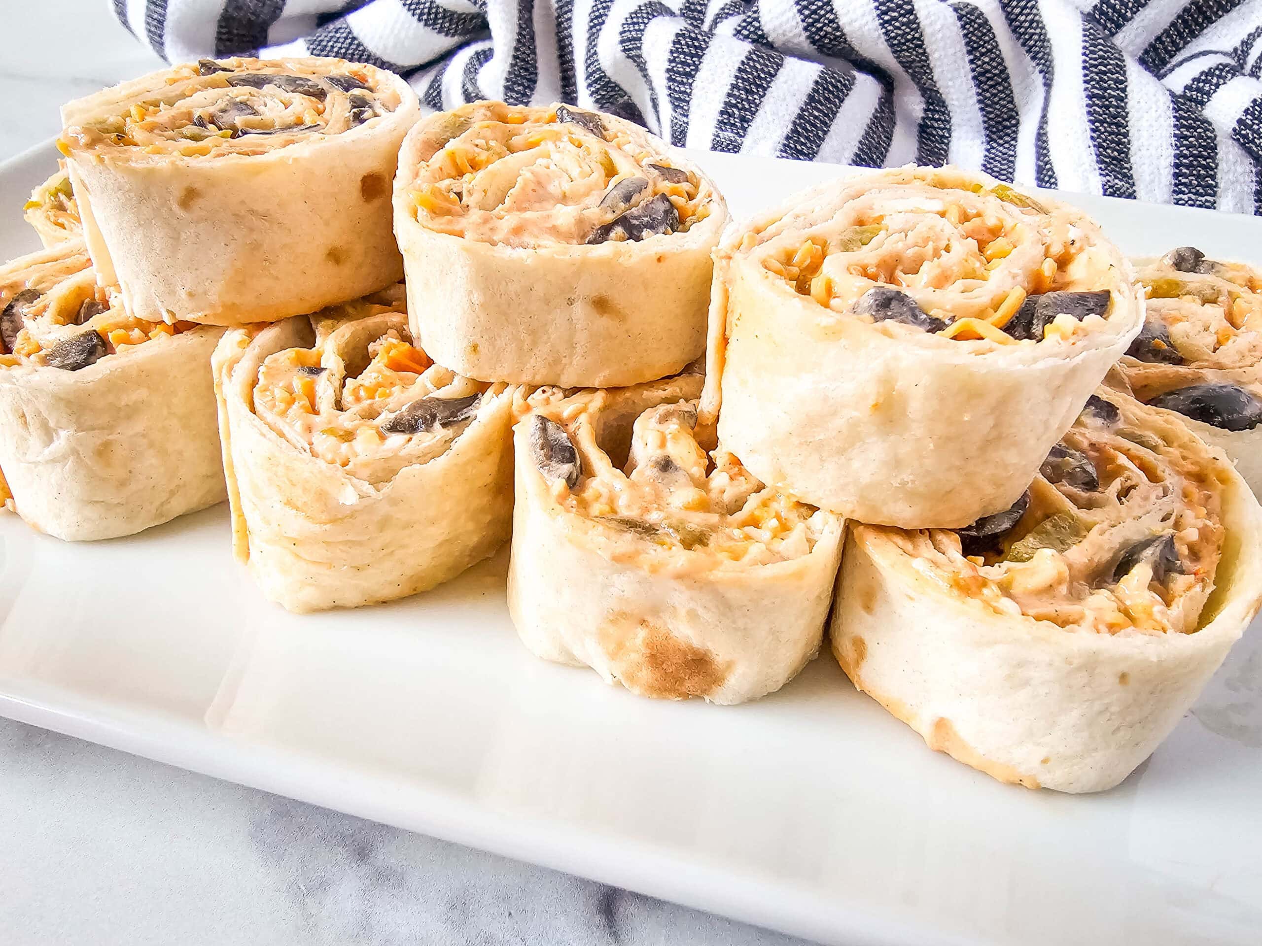 Easy-to-Make, Flavor-Packed Cheesy Mexican Pinwheels 1 Easy-to-Make, Flavor-Packed Cheesy Mexican Pinwheels