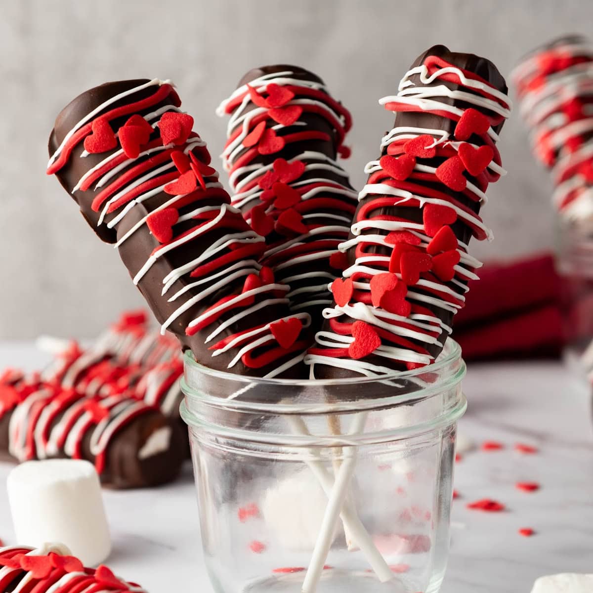 Chocolate-Covered Valentine’s Day Marshmallow Pops 1 valentines day marshmallow pops featured image