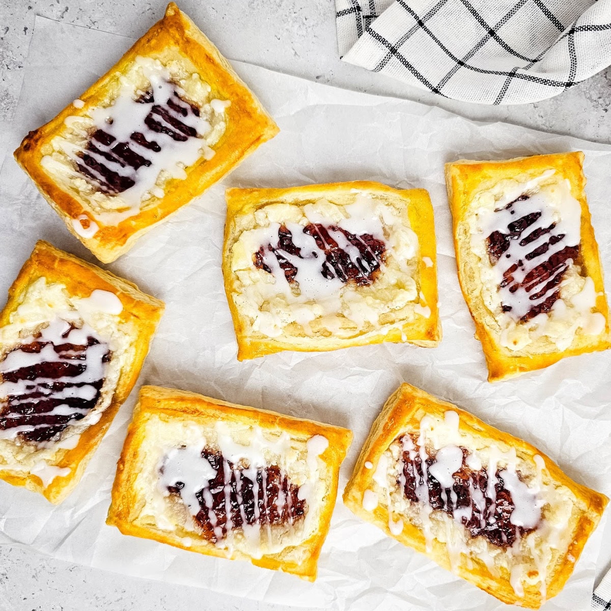 Flaky Puff Pastry Strawberry Danishes 1 strawberry danish featured image