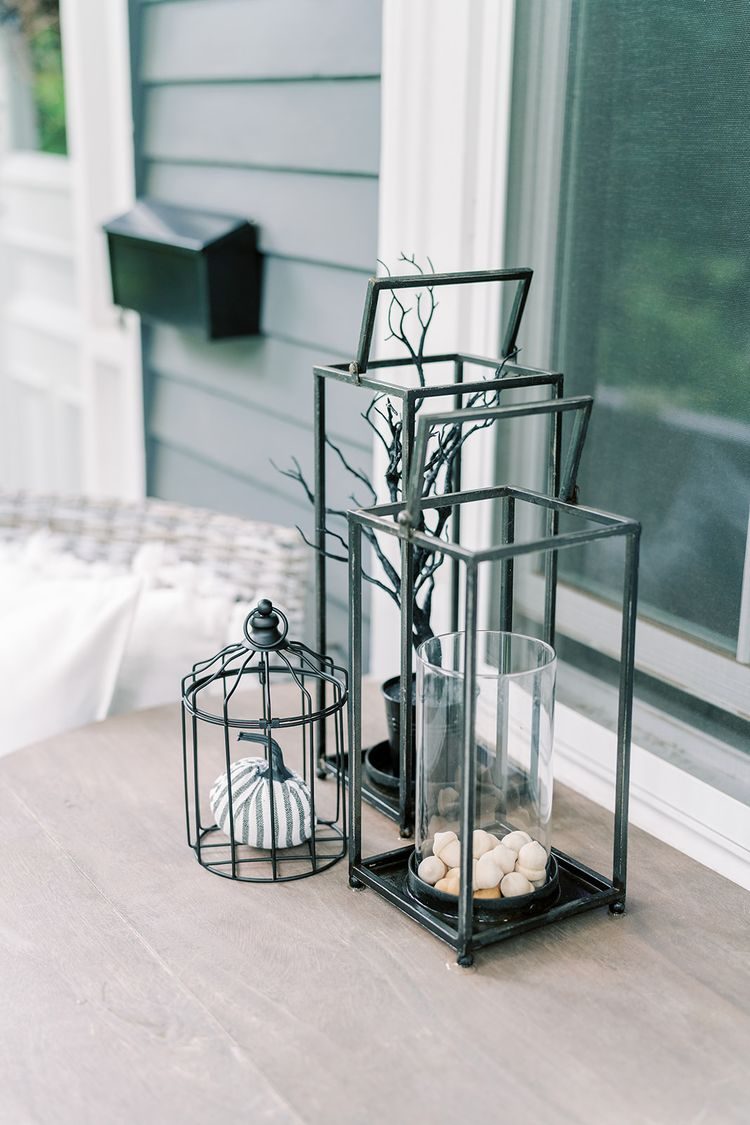 Black cage lantern and pumpkin
