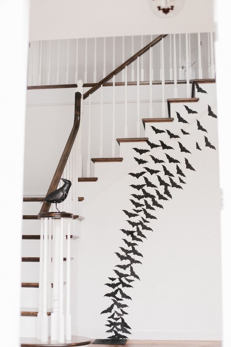 paper bats on wall
