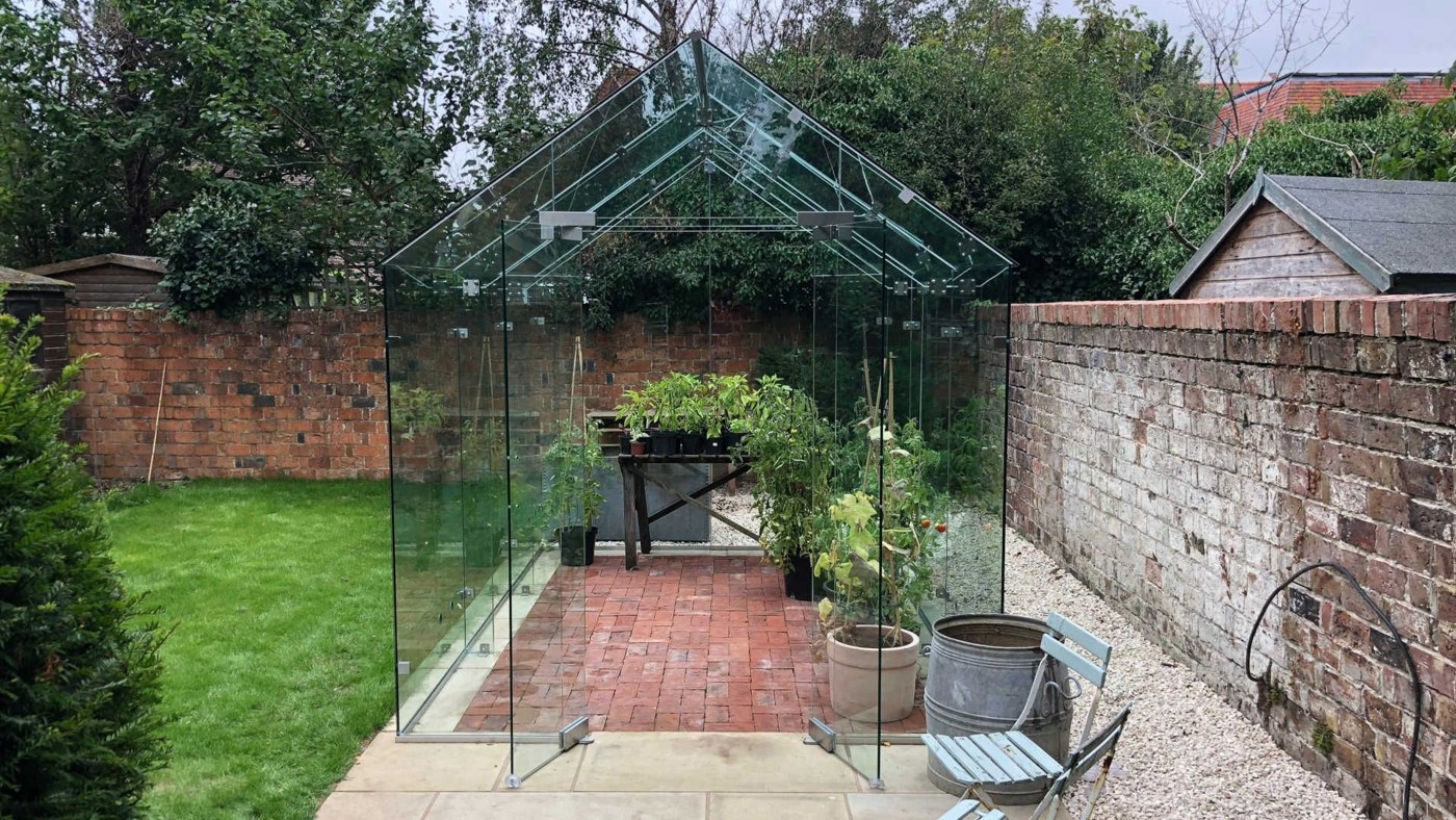 Modern greenhouse with a slim frame and large glass panes