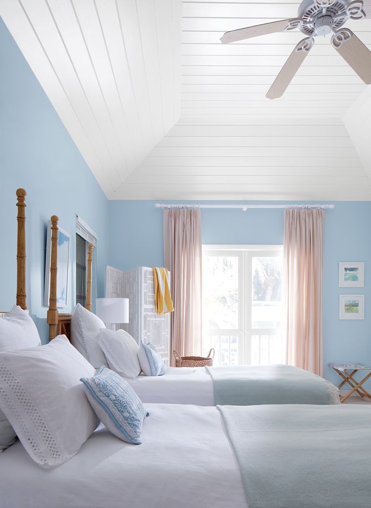 Bedroom with pastel blue walls
