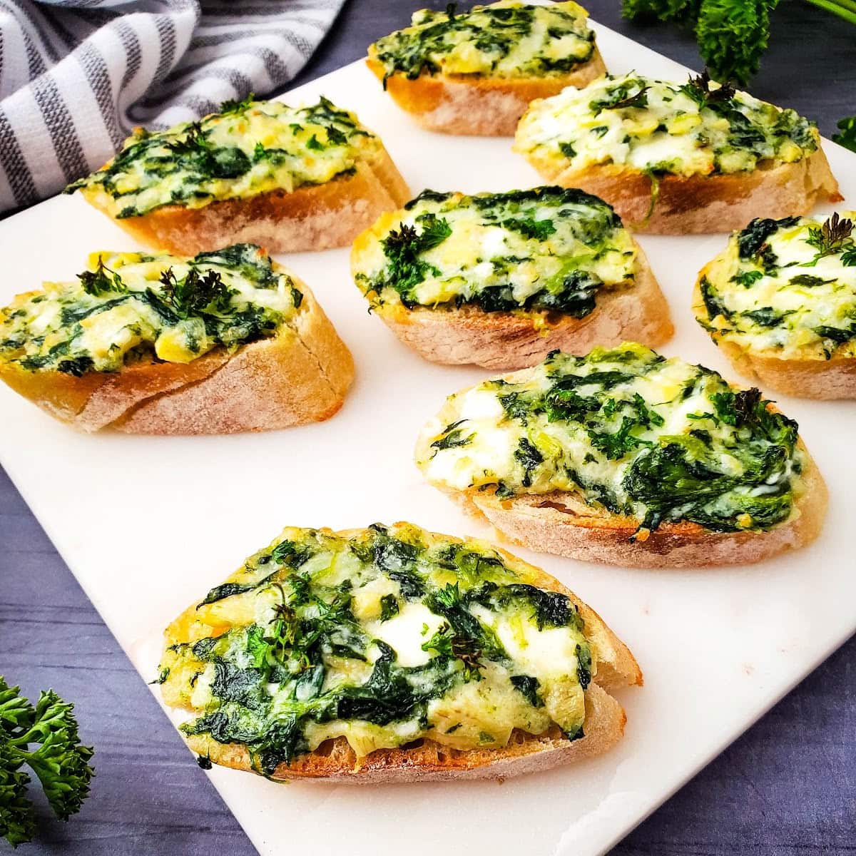 Creamy Baked Spinach Artichoke Crostini 1 spinach artichoke crostini featured image