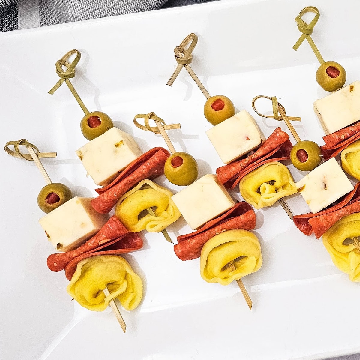 Cheesy Tortellini Skewers with Olives & Pepperoni 1 Cheesy Tortellini Skewers with Olives & Pepperoni