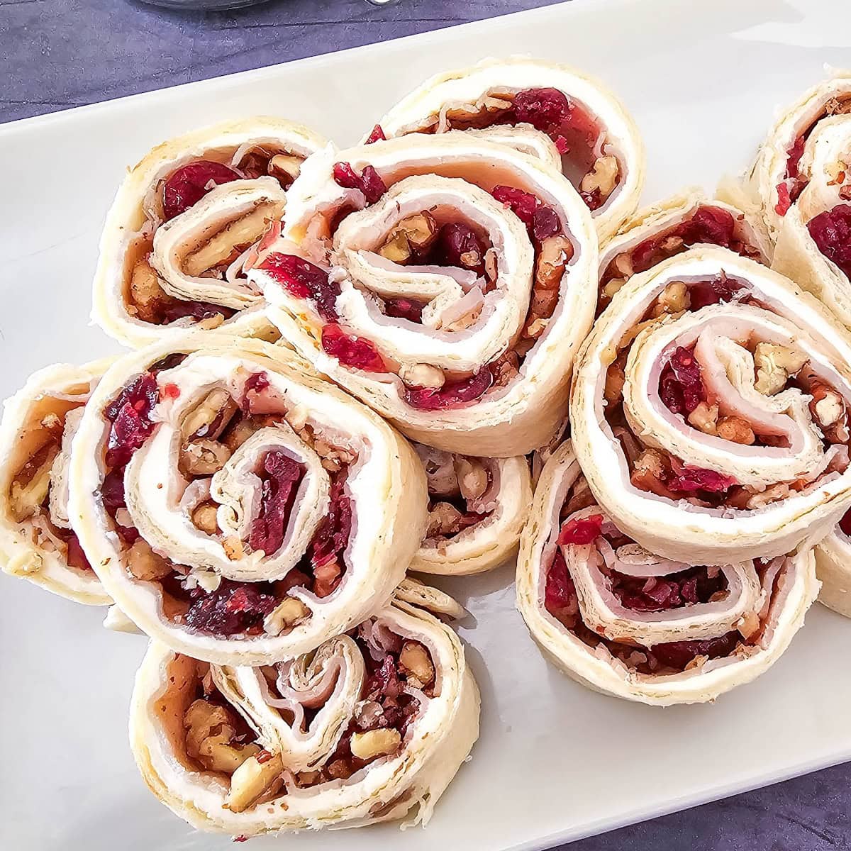 Turkey Cranberry Pecan Pinwheels 1 turkey cranberry pecan pinwheels featured image