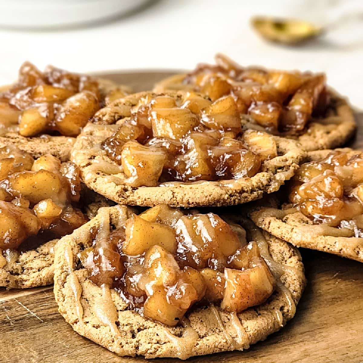Warm, Gooey Apple Pie Cookies on Gold Marble 1 apple pie cookies featured image